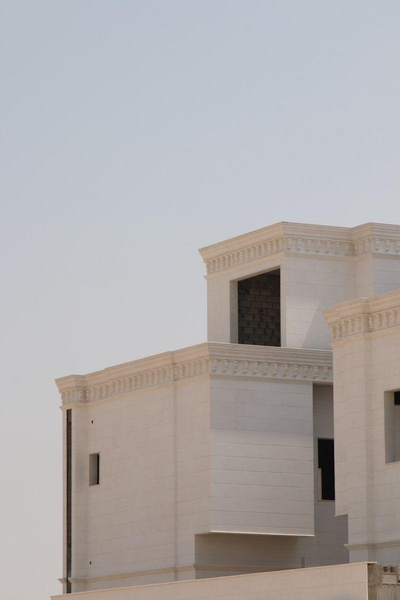 Villa Facades in Al Khor — natural stone by Auckland Construction & Development