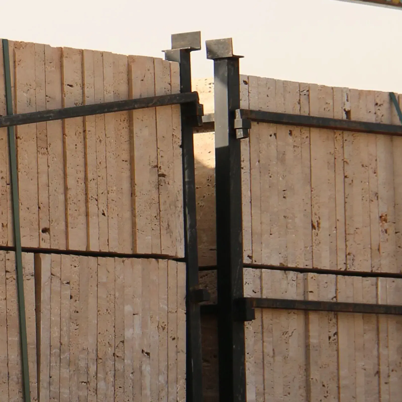 Travertine natural stone cladding supplied and installed by Auckland in Qatar